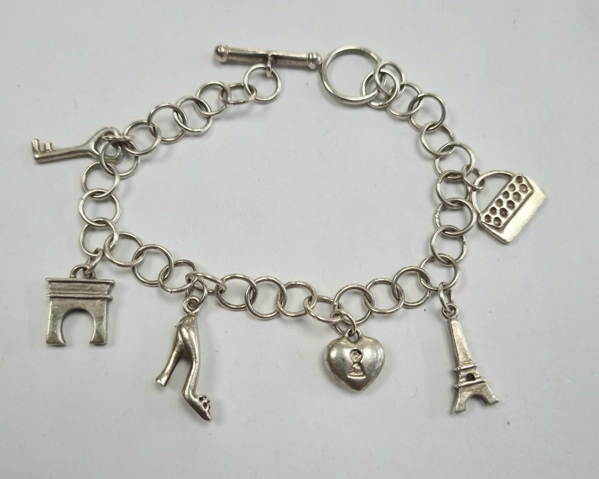 Silver charm bracelet 7"