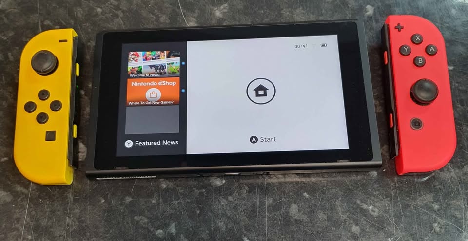 Nintendo Switch Console, 32GB HAC-001(01) + Neon Yellow/Orange Joy-Con