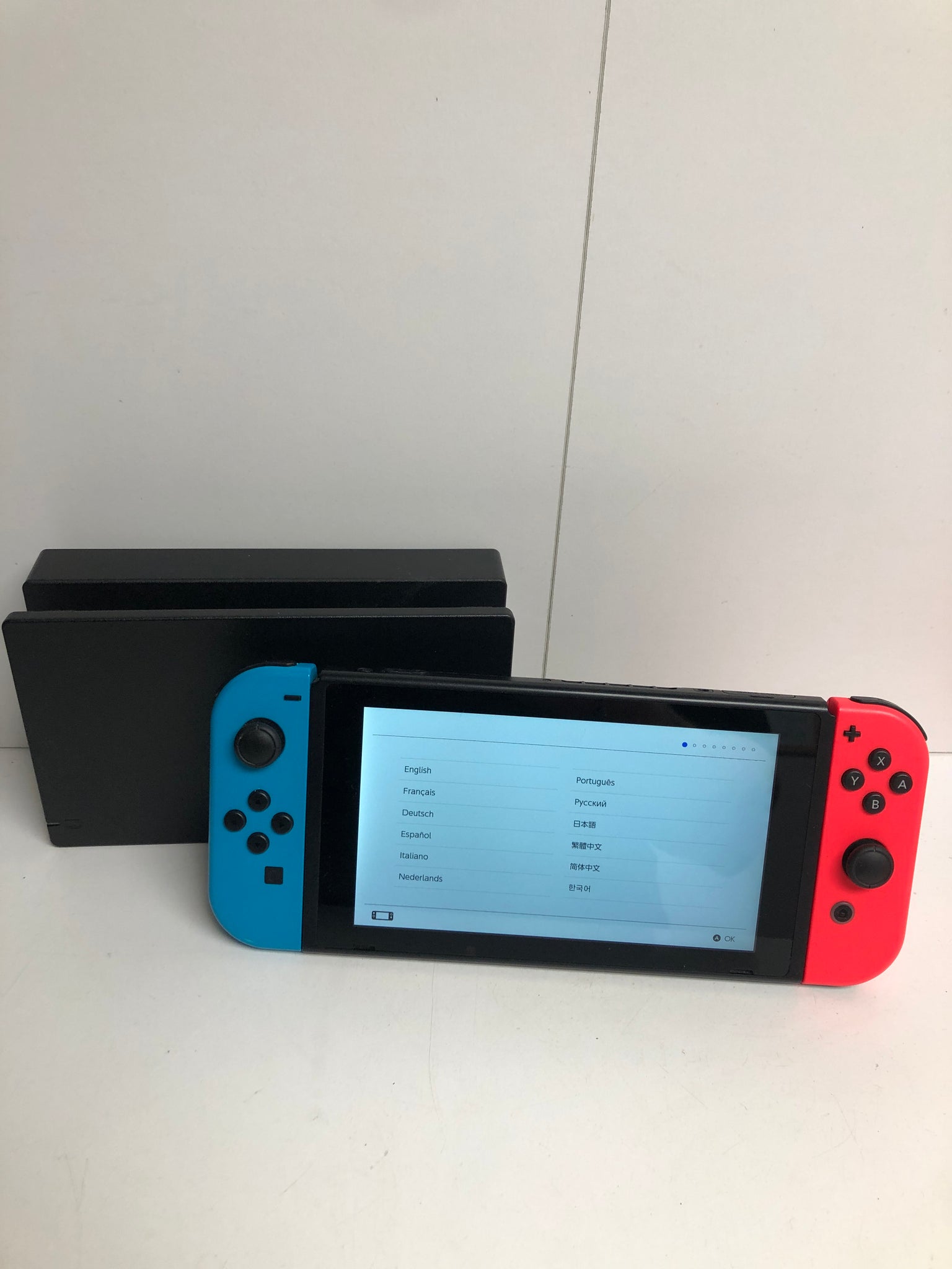 Nintendo Switch with Neon Blue and Neon Red Joy-Con