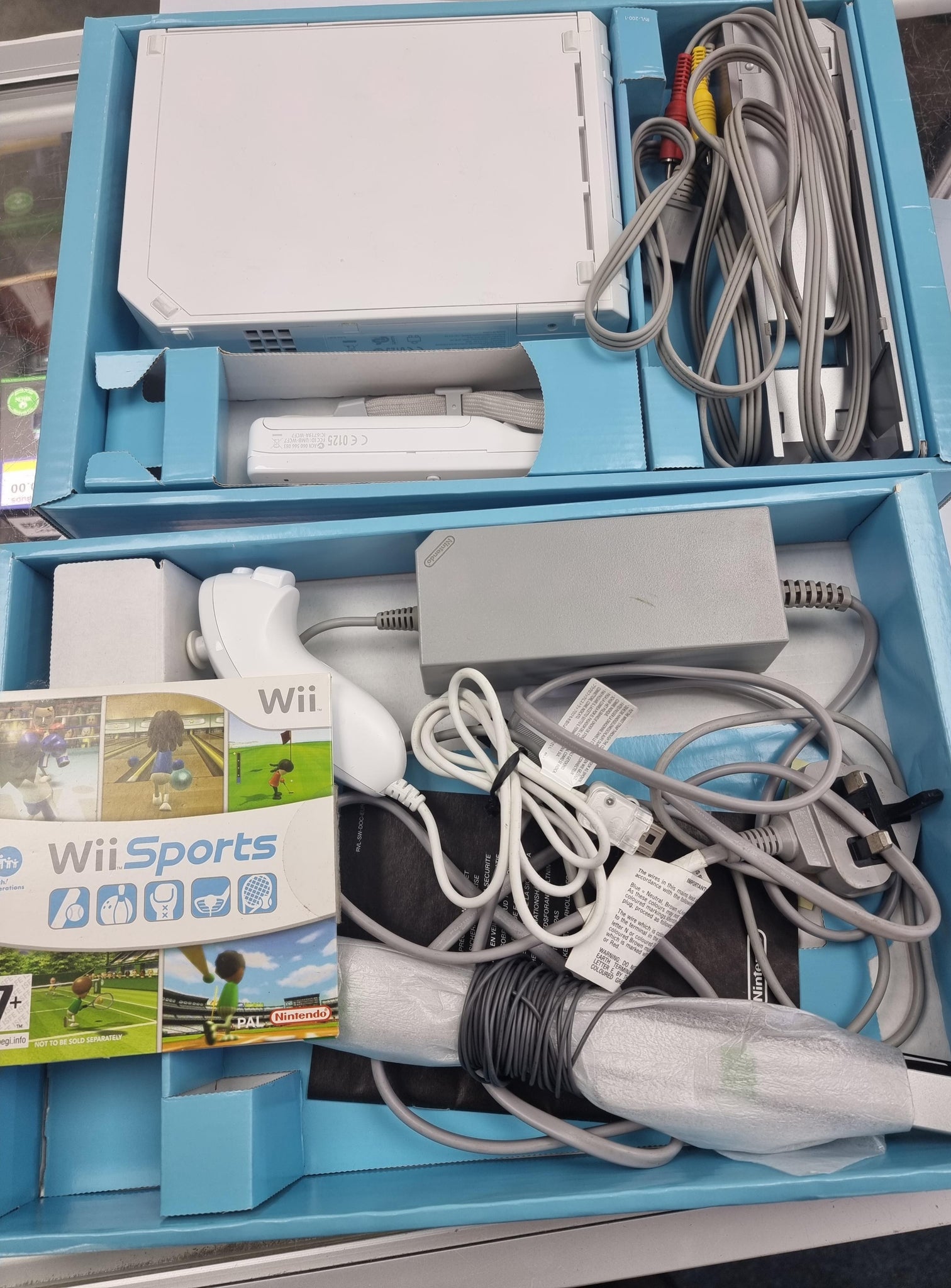 Wii Console (Includes Wii Sports Game + wii fit Board 10 games