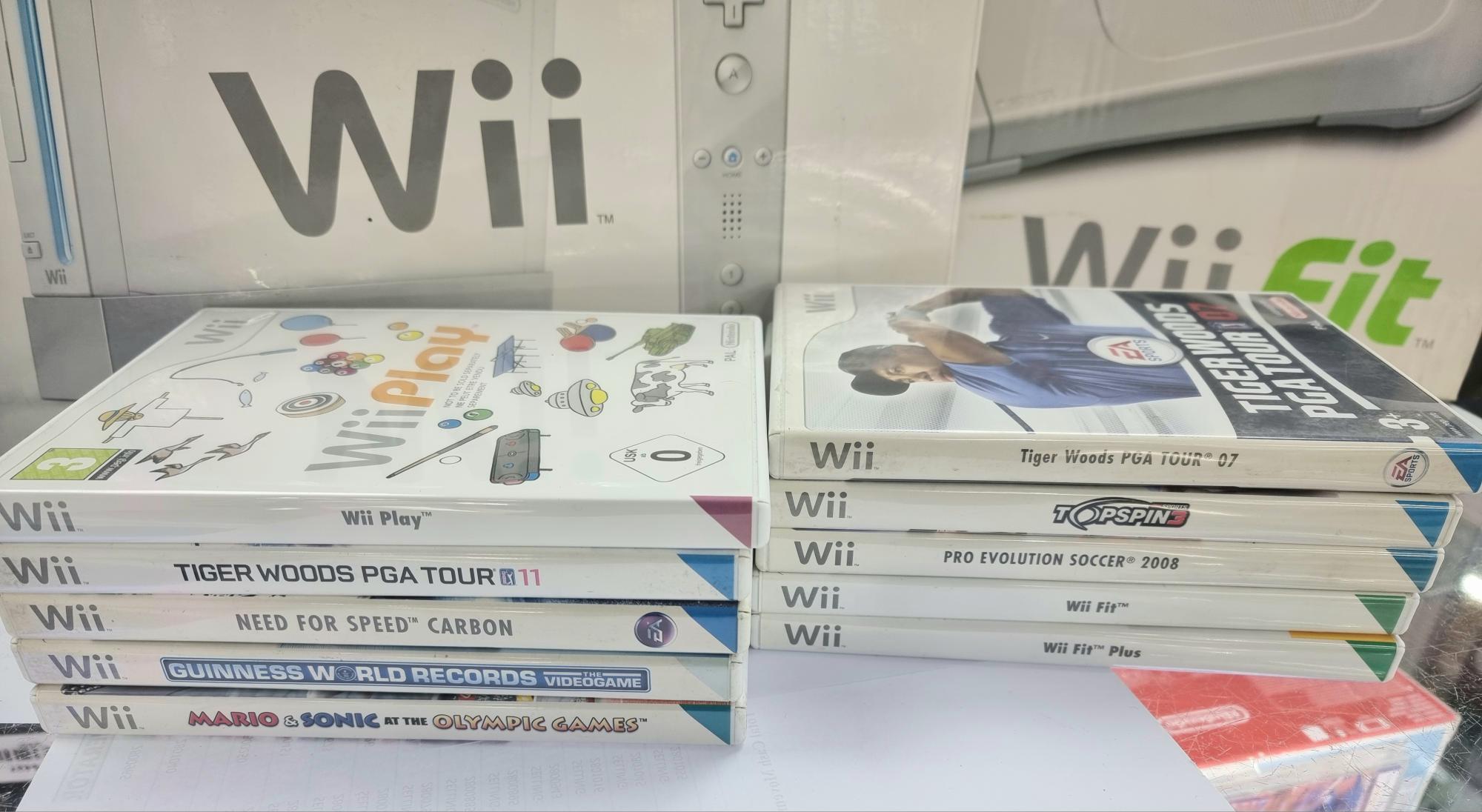 Wii Console (Includes Wii Sports Game + wii fit Board 10 games