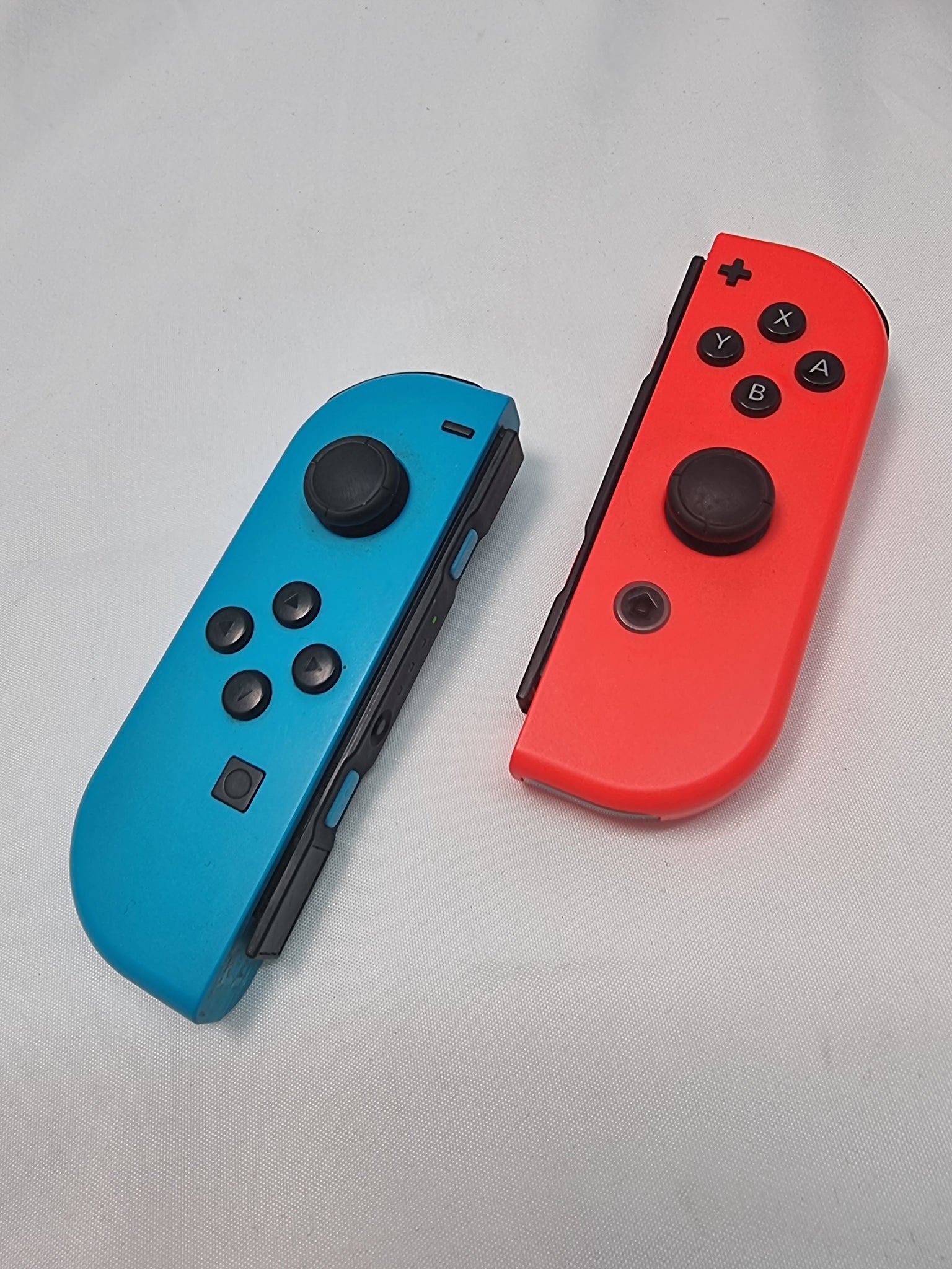 Nintendo Switch (Neon Red/Blue) LEFT JOYCON STICKS, with carry case