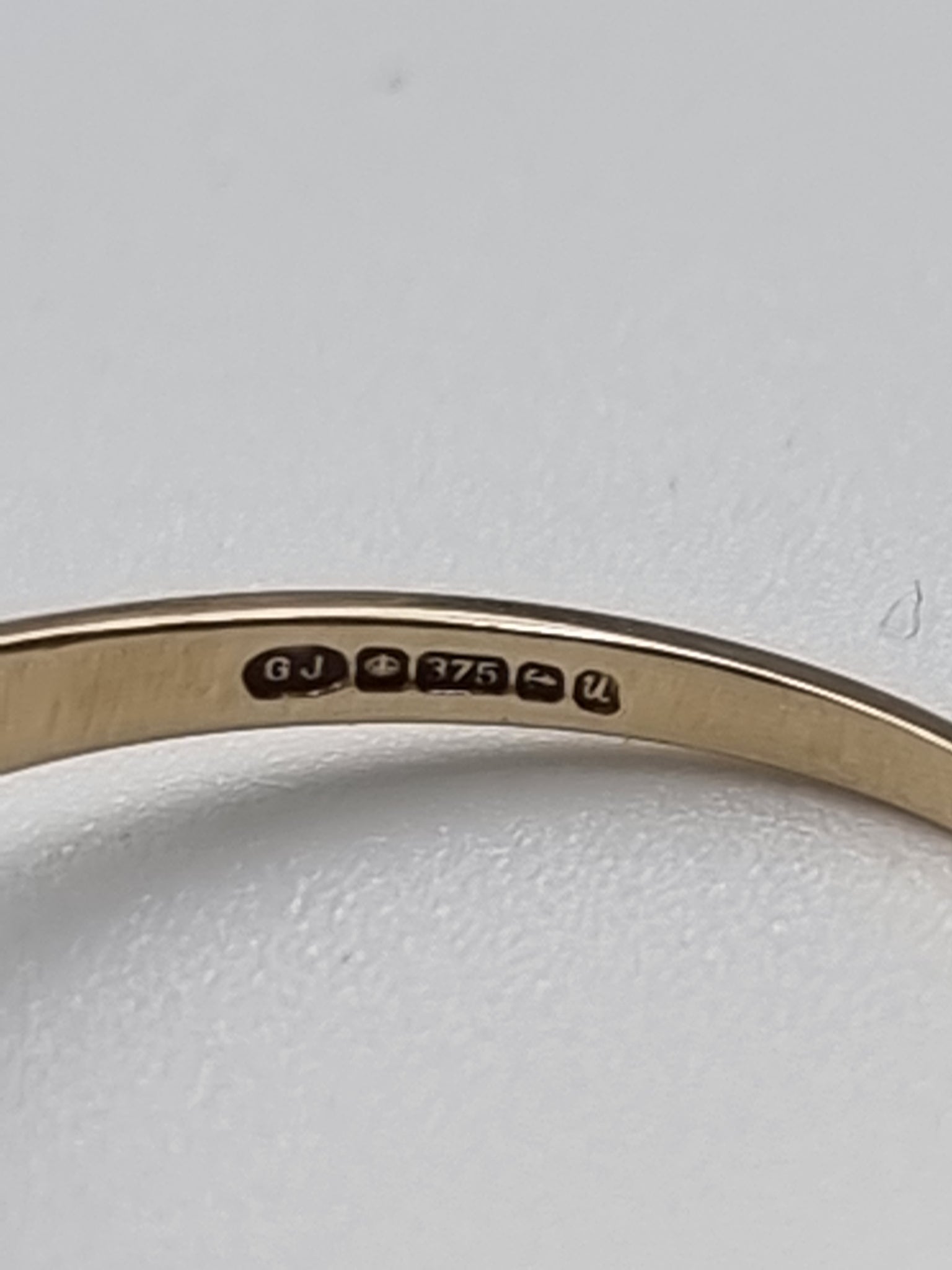 9CT Yellow Gold Ring With Black Stone And Diamond Stones - Size S - 2.43 Grams