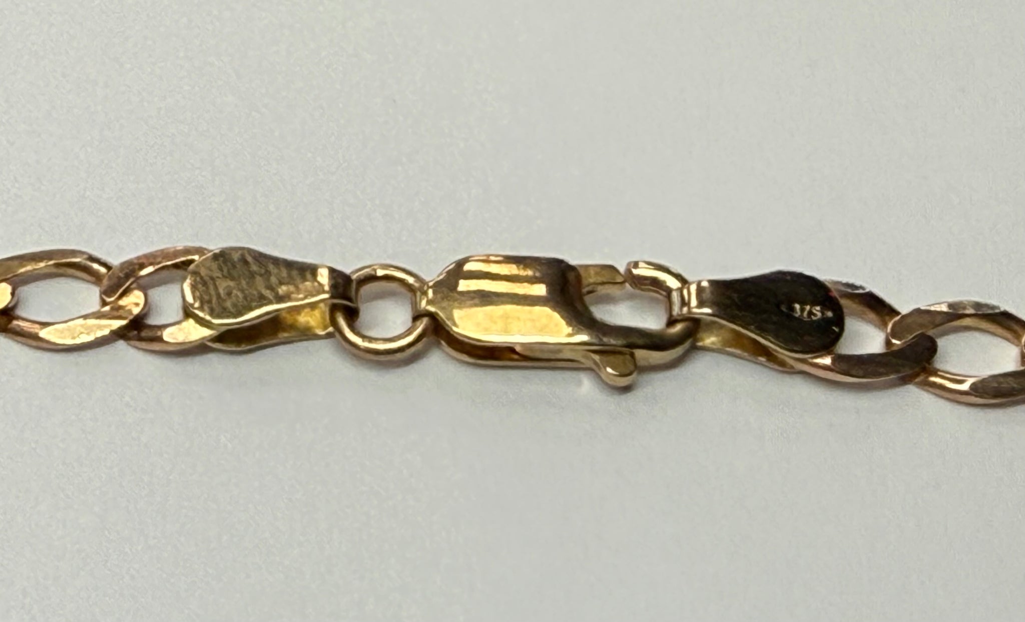9ct gold curb chain 25"