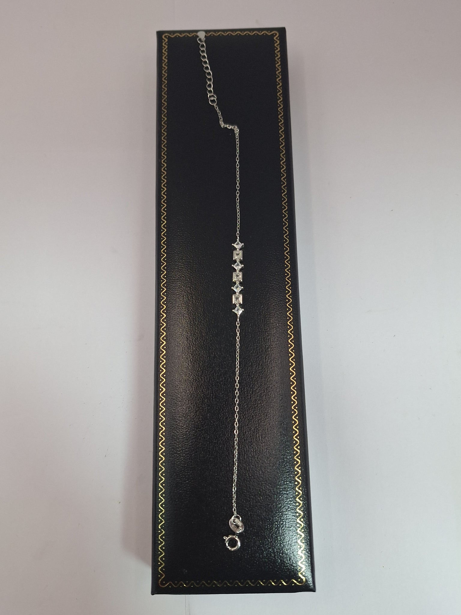 NEW OTHER SILVER BRACELET WITH STAR AND SQUARE ,CZ ,925, LENGHT 8"  WEIGHT 1.9G .