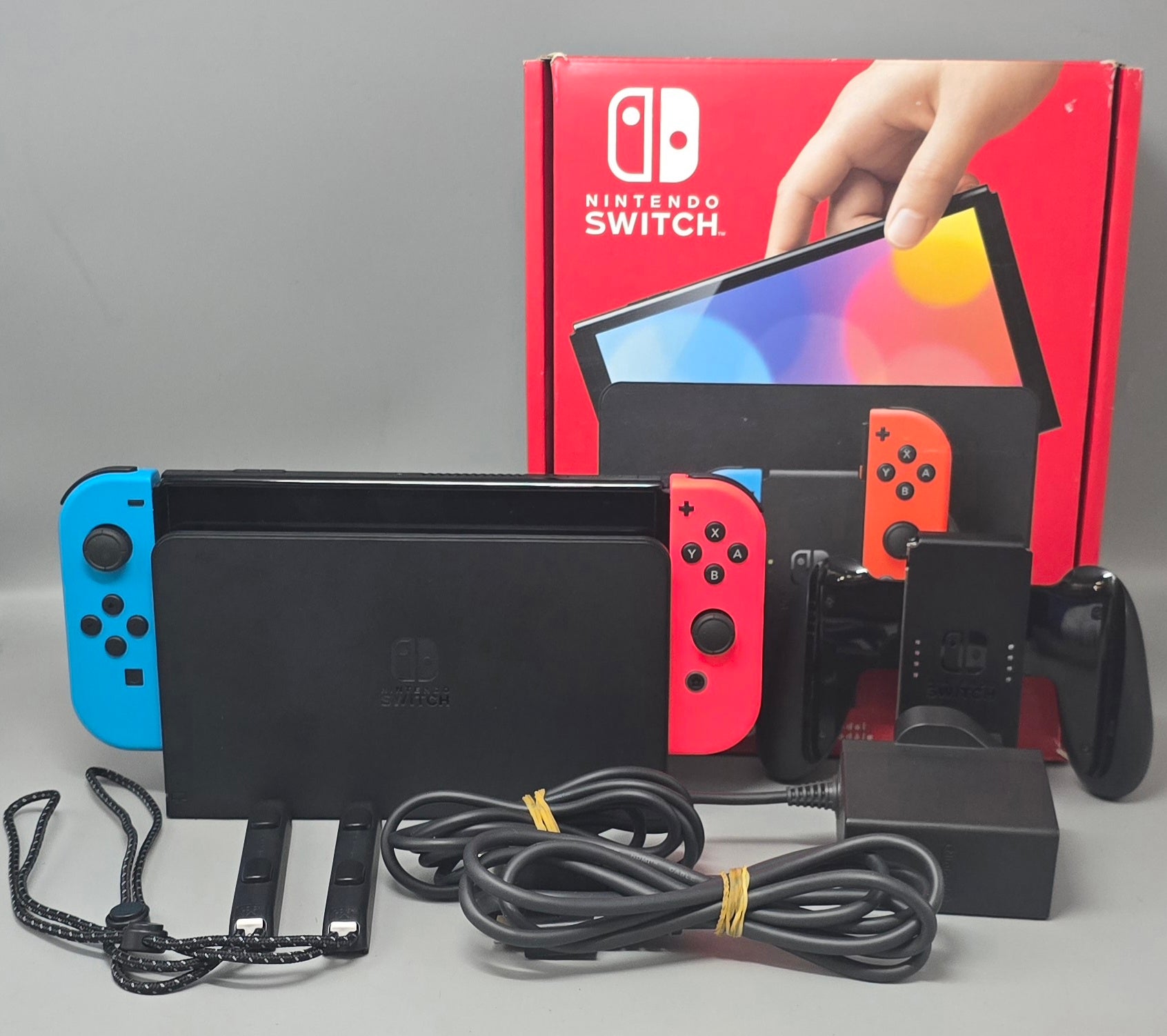 Switch Console, 64GB OLED + Neon Red/Blue Joy-Con, Boxed