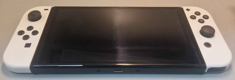 Nintendo Switch Console, 64GB OLED + White Joy-Con, Discounted