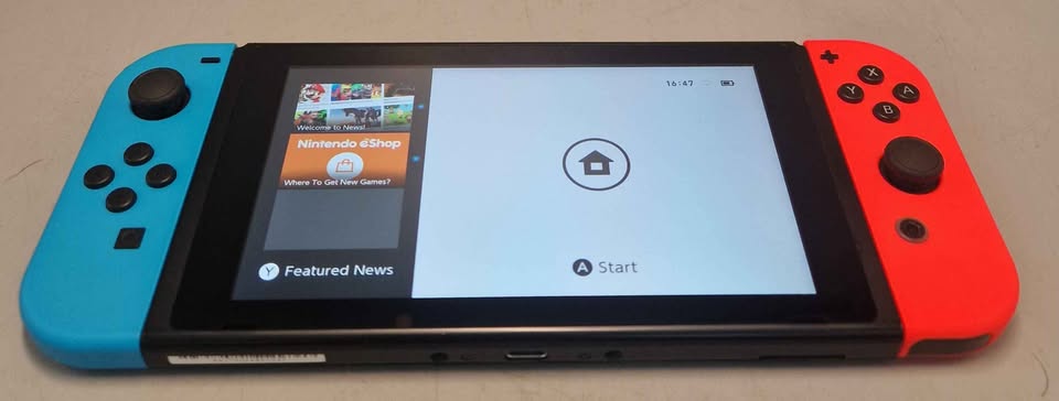 Nintendo Switch Console, 32GB + Neon Red/Blue Joy-Con, Boxed