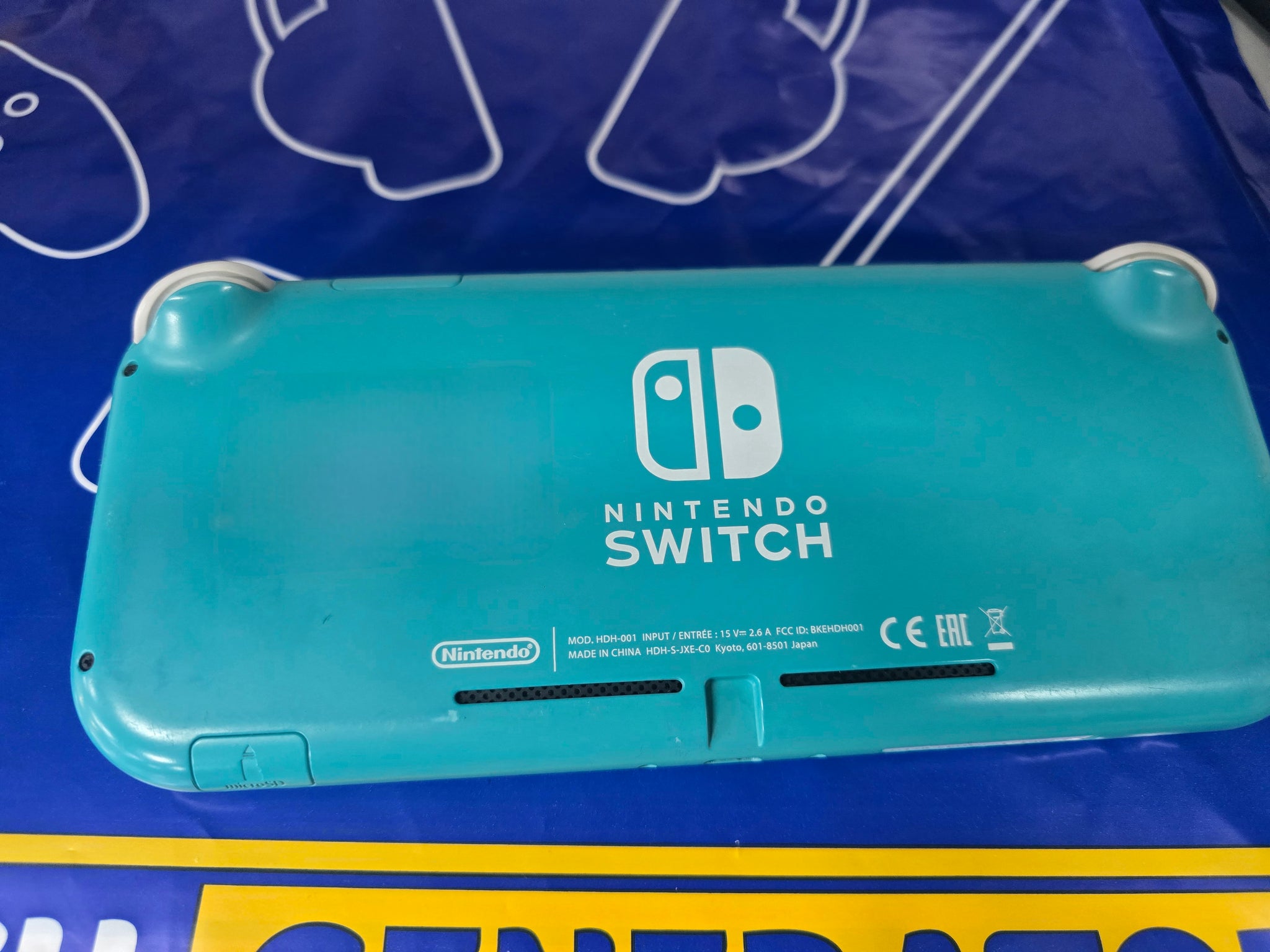 Switch Lite Turquoise Unboxed *Cable Only*