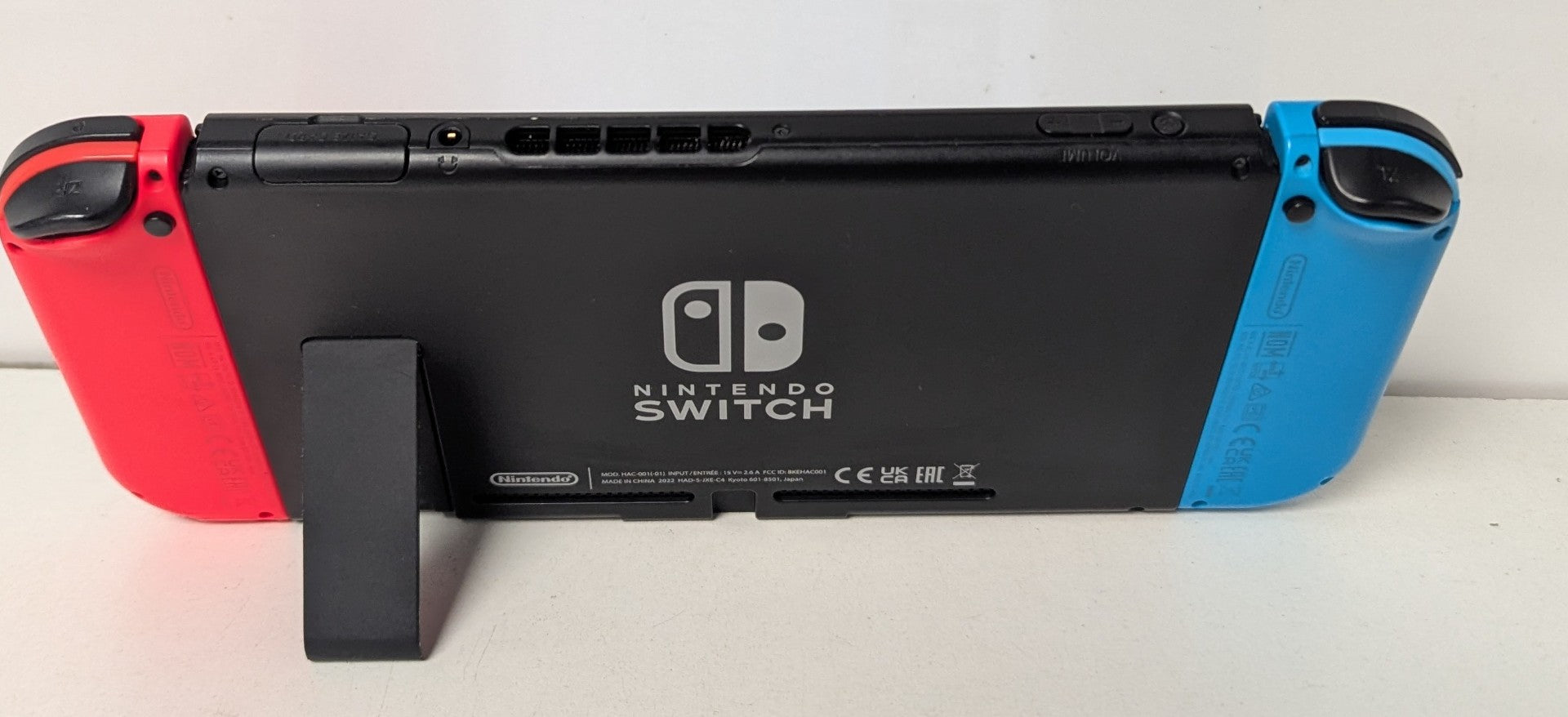 Nintendo Switch Console Neon Red/Blue & 2 Games