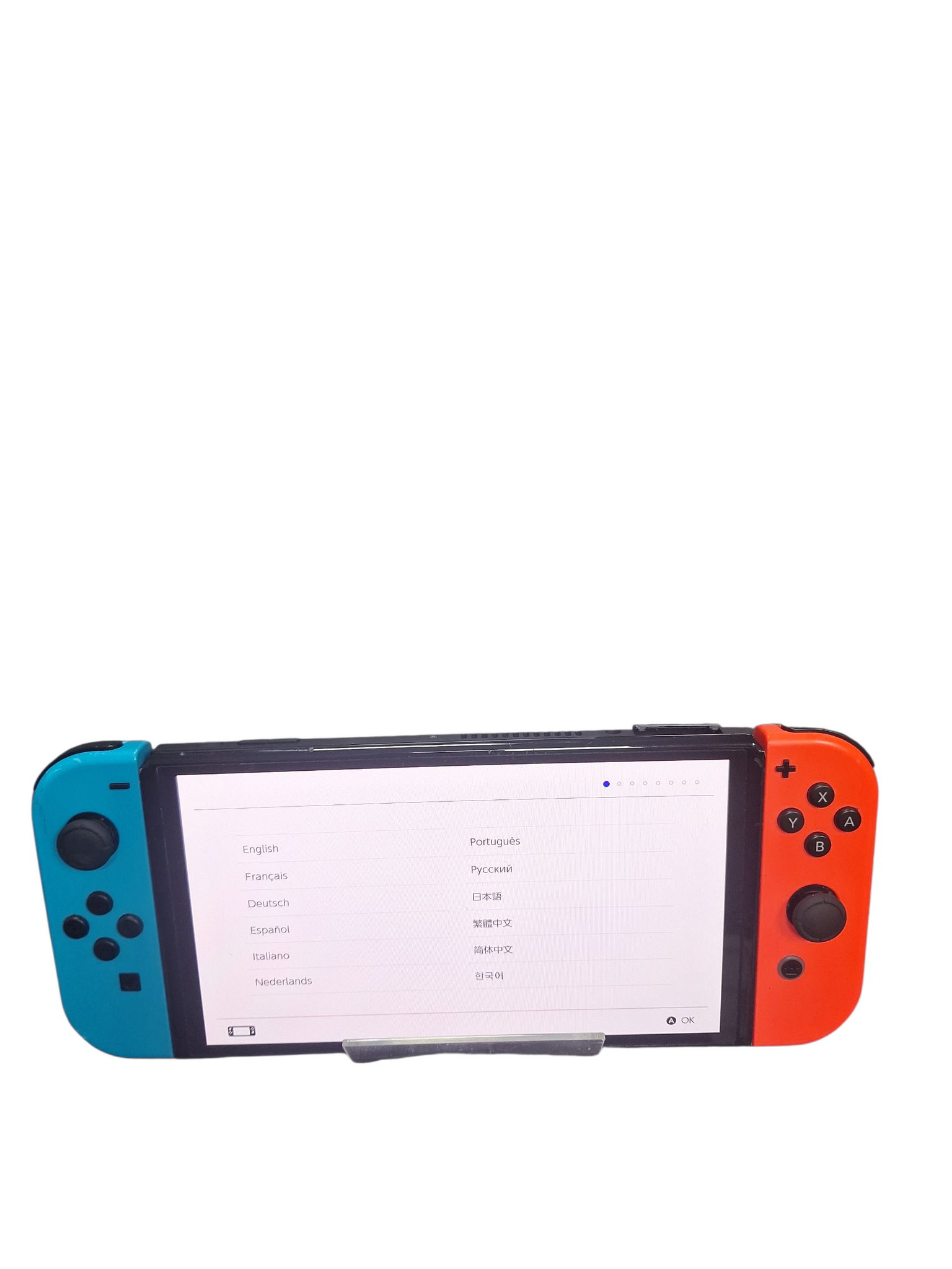 The Nintendo Switch OLED model with white Joy-Cons features a 7-inch OLED screen, 64GB of internal storage, and an NVIDIA customized Tegra processor.