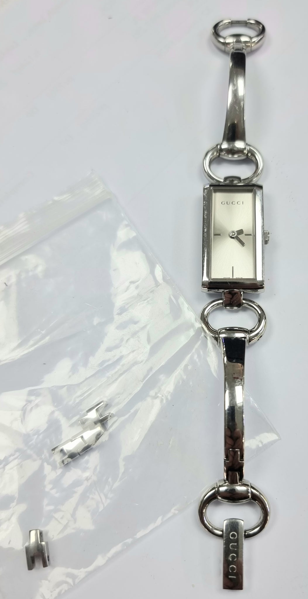 GUCCI 119 TORNAVONI LADIES WRISTWATCH SILVER STAINLESS STEEL RECTANGULAR CASE