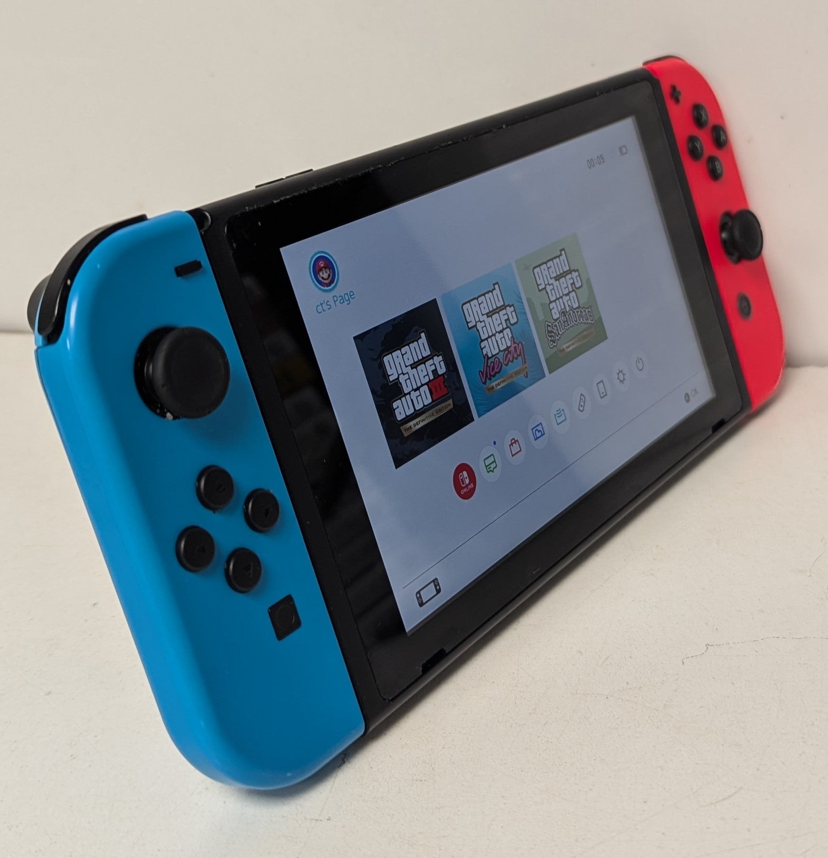 Nintendo Switch Console Neon Red/Blue & 2 Games