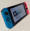 Nintendo Switch Console Neon Red/Blue & 2 Games