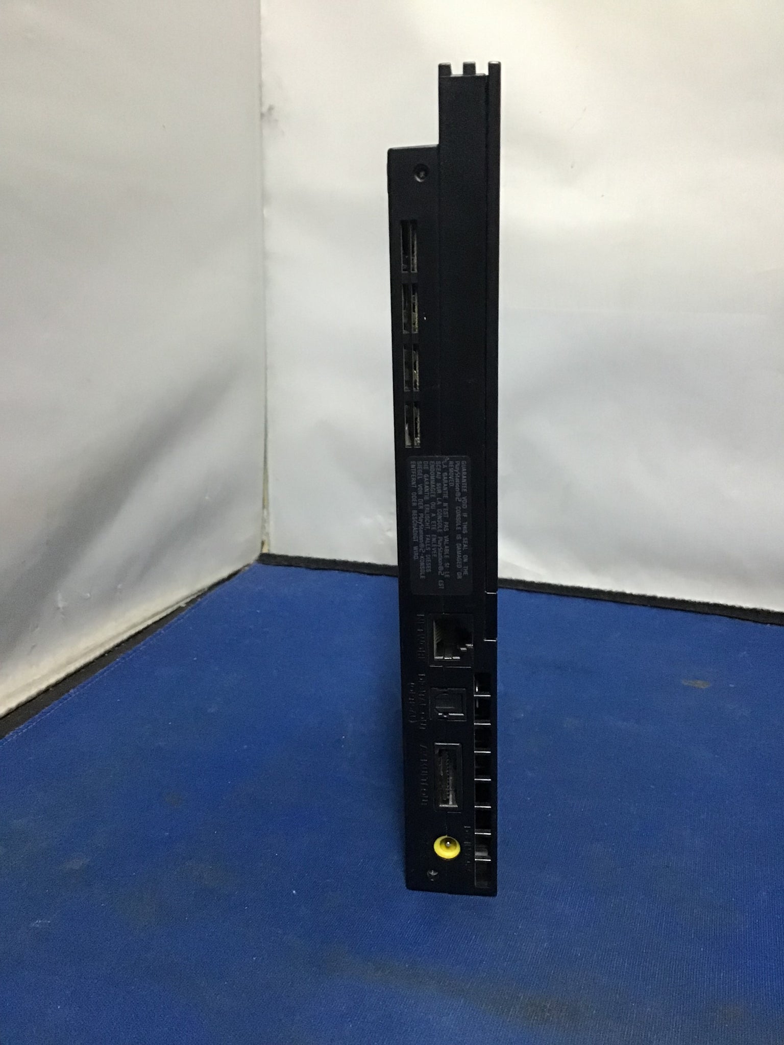 PlayStation 2 Black Console + Green Pad