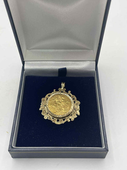 Full sovereign coin 22ct in a 9ct mount