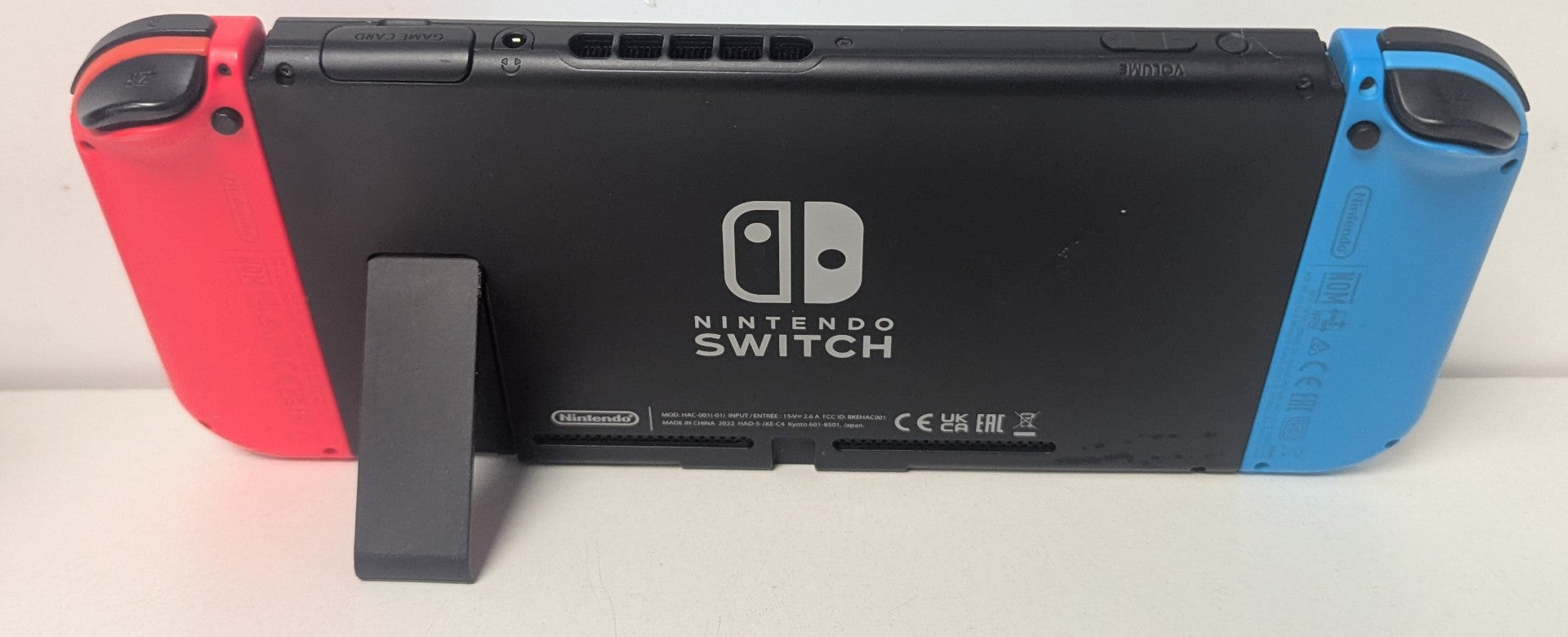 Nintendo Switch Console - Neon Red/Blue & 2 Unboxed Games