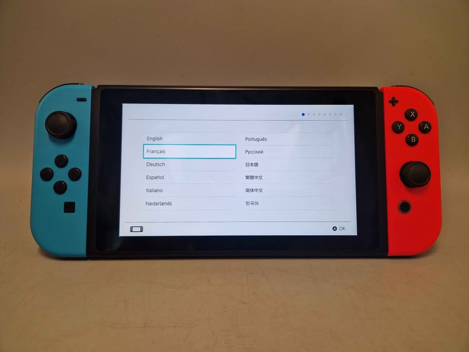 Nintendo Switch Console, 32gb, with wheel and all required cables. Unboxed