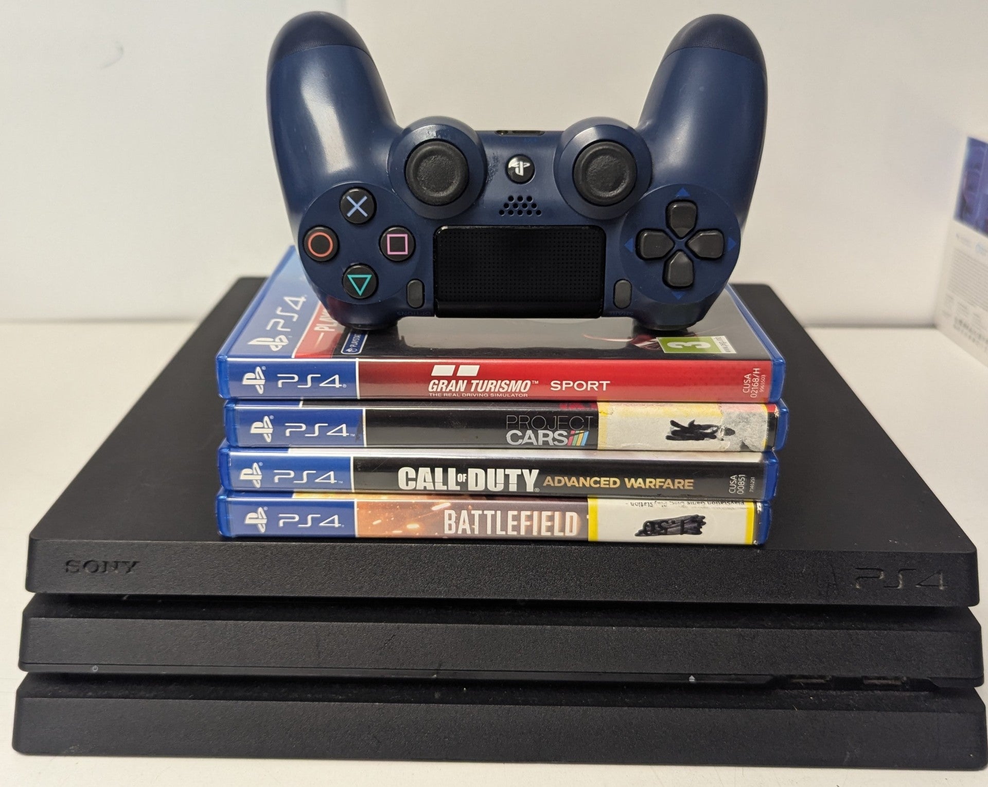 Sony Playstation 4 Pro 1TB Console & 4 Games