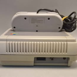 Super Nintendo Entertainment System 2 controllers and Leads (Some Case Damage shown in images)