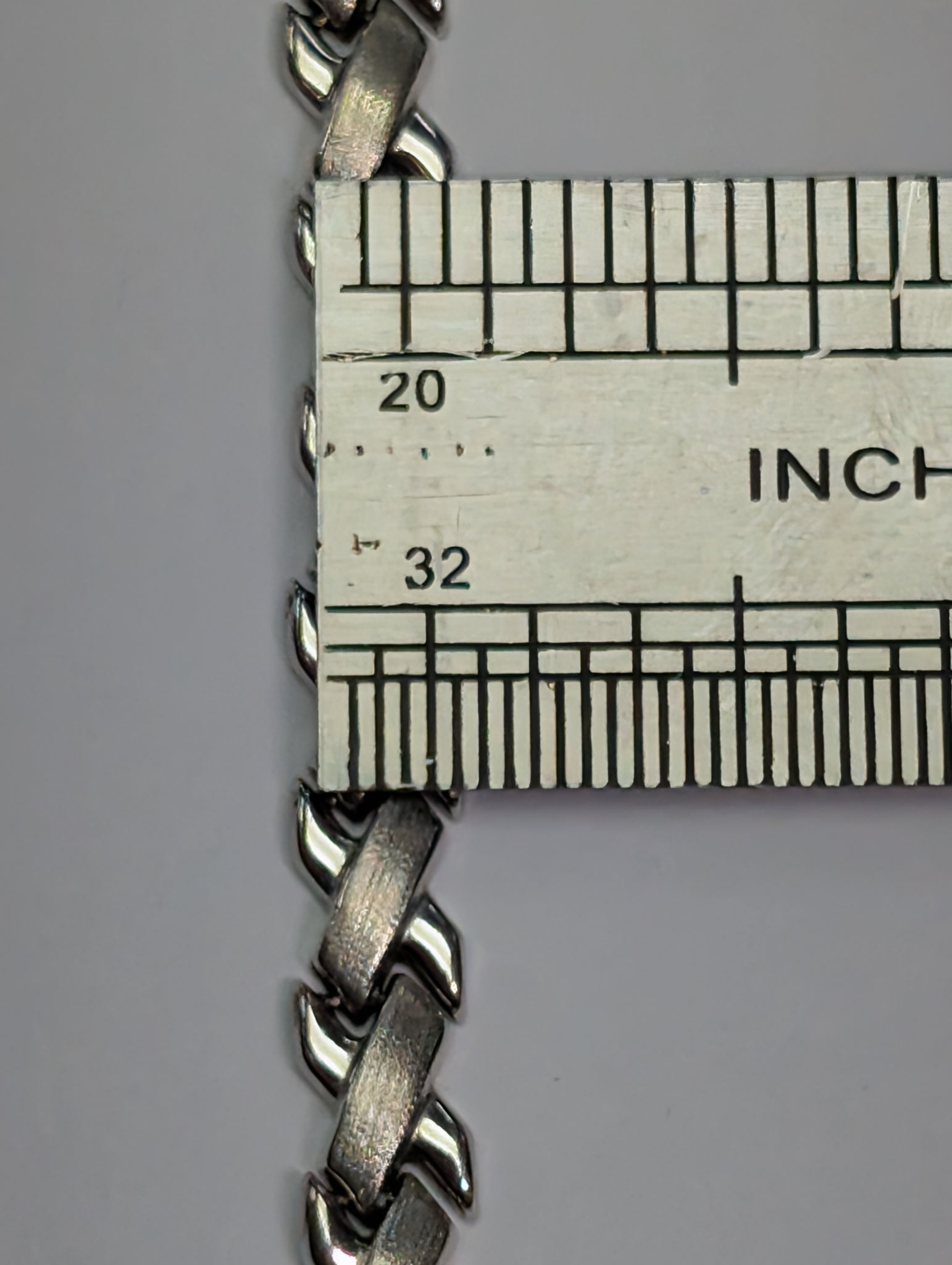 9ct white gold flat x bracelet