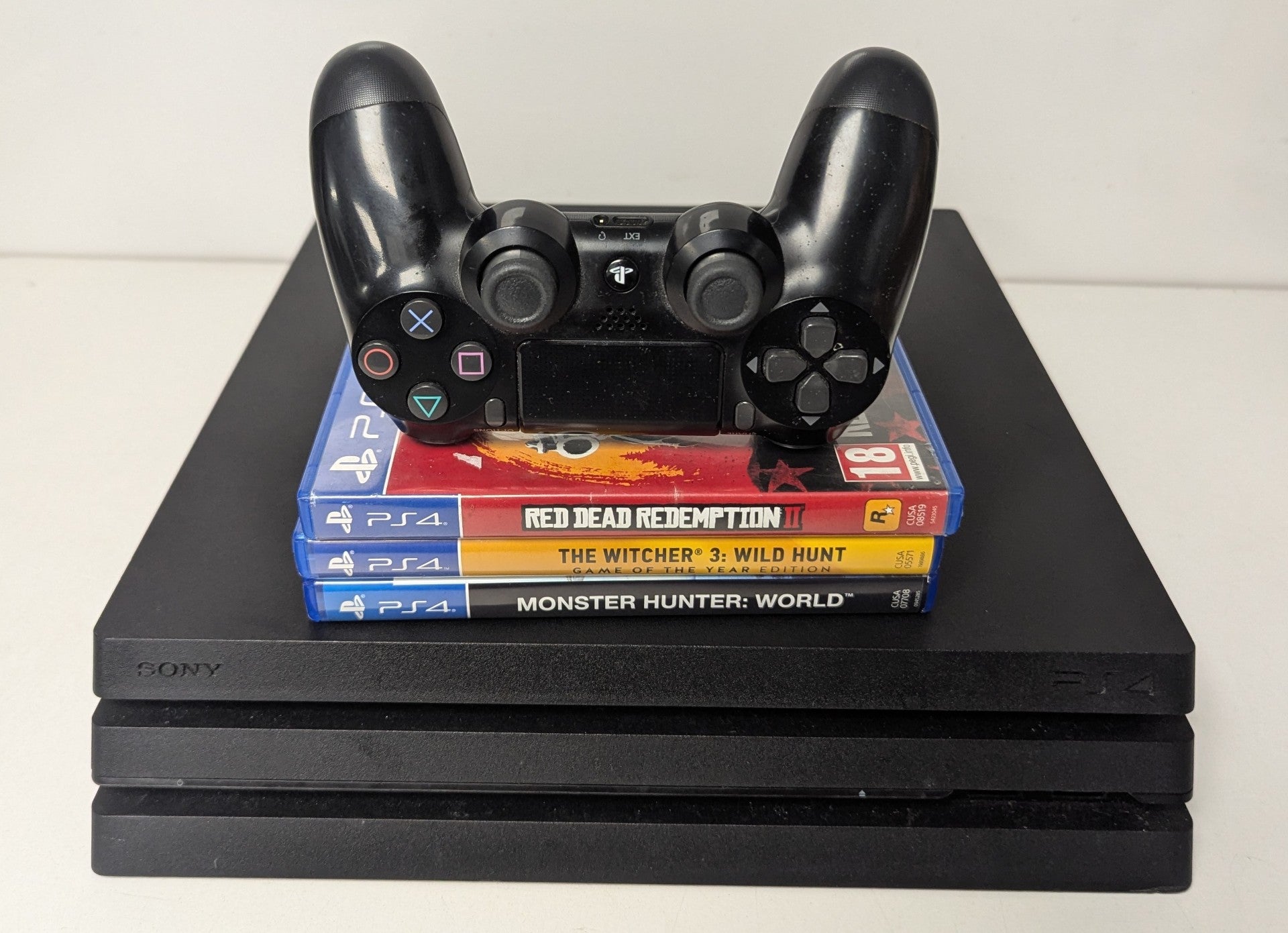 Sony Playstation 4 Pro 1TB Console & 3 Games