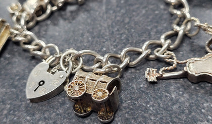 925 - Silver Charm Bracelet - 51.08g