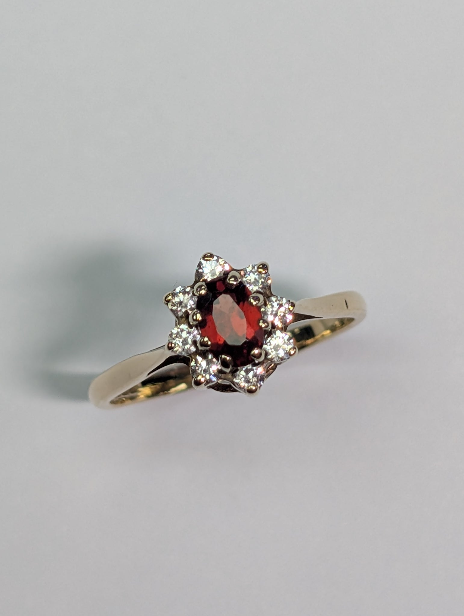 9CT Gold Ring With Red And Clear Stones