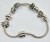 Pandora Bracelet 20cm with 8 Silver Charms (not pandora)