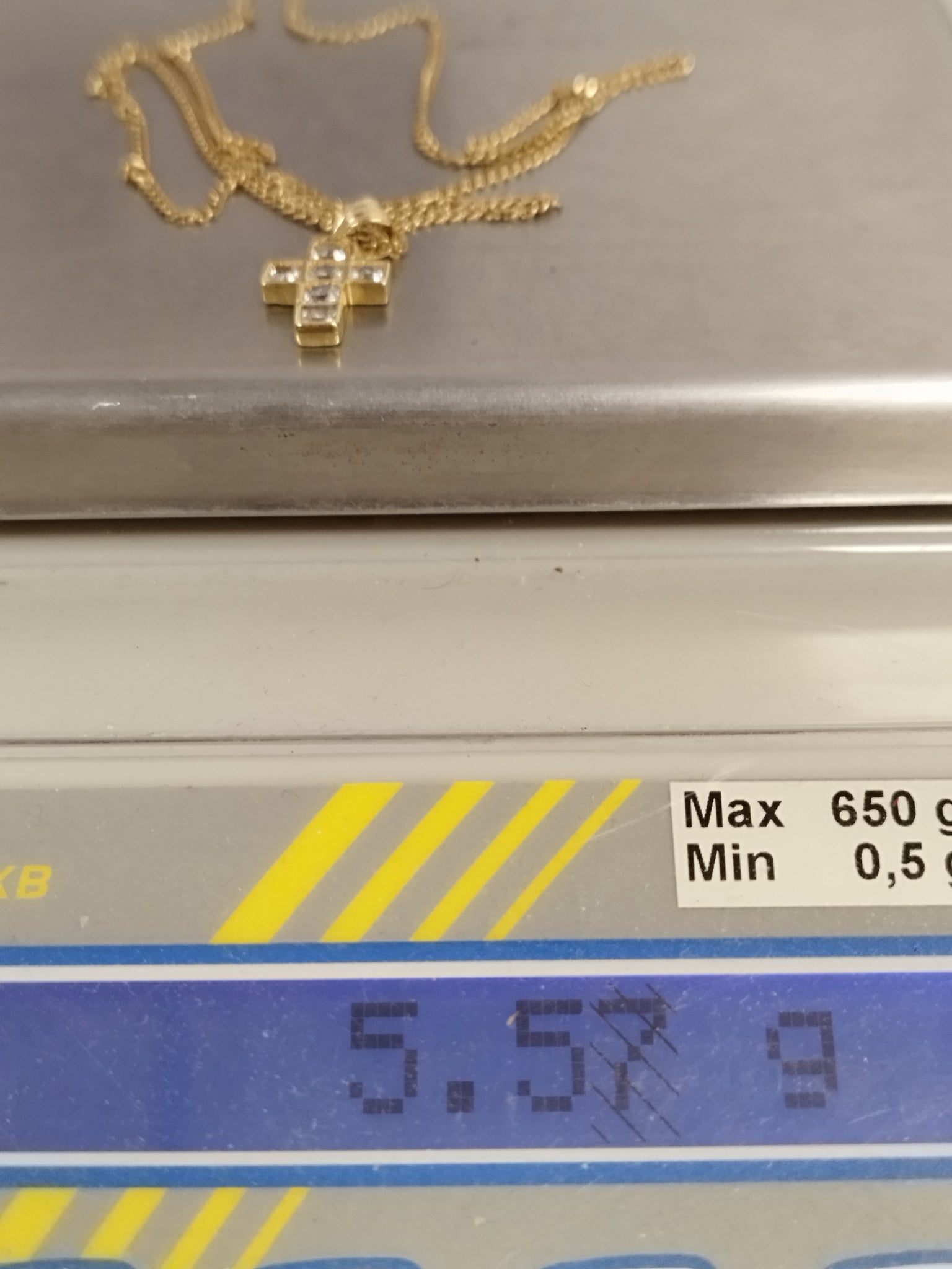 9ct Yellow Gold Cross Bezel Set with 6 Square Clear Stones on a 23" 9ct Gold Curb Chain