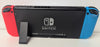 Nintendo Switch Console - Neon Red/Blue & 2 Games