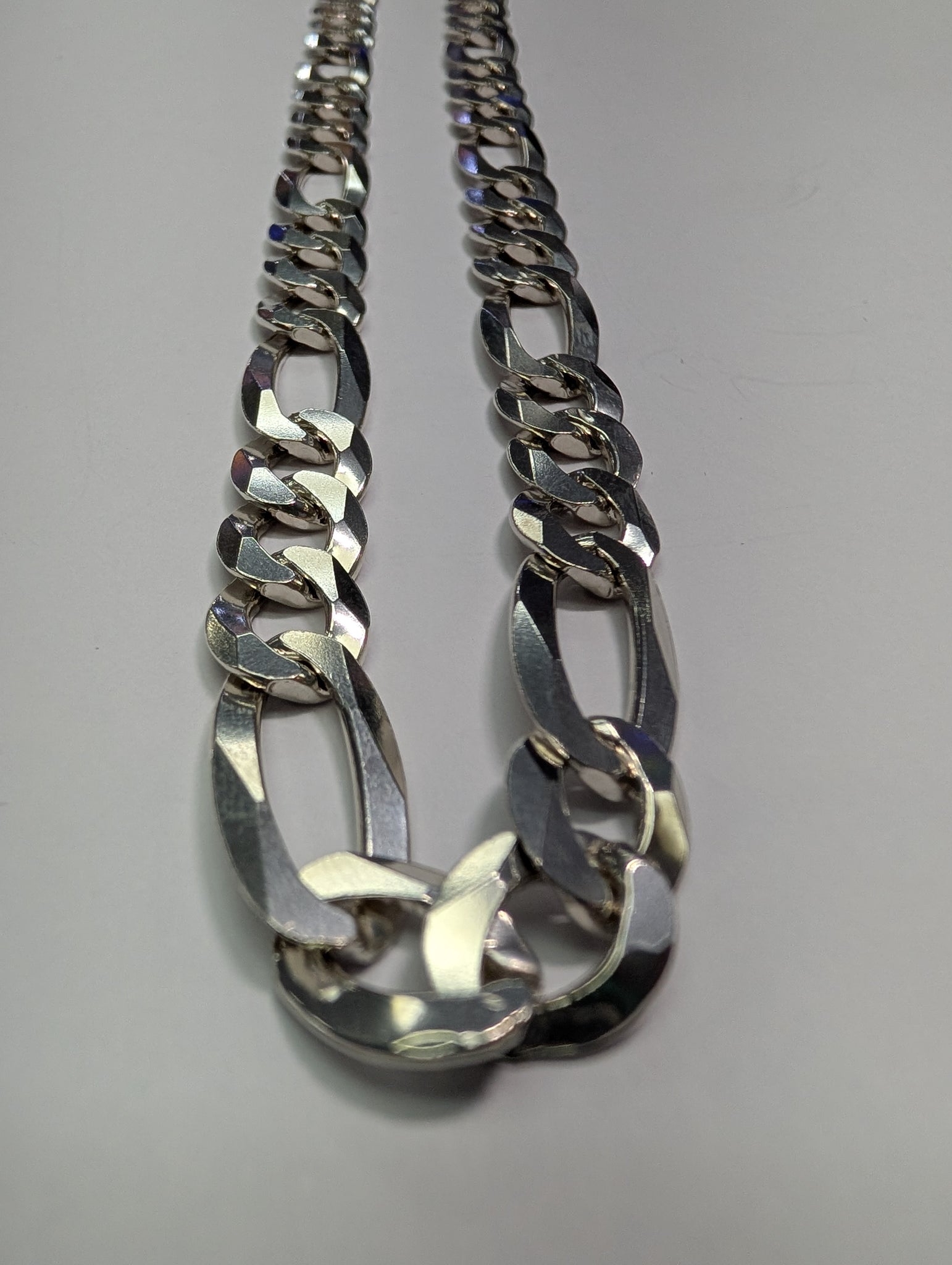Heavy silver figaro chain