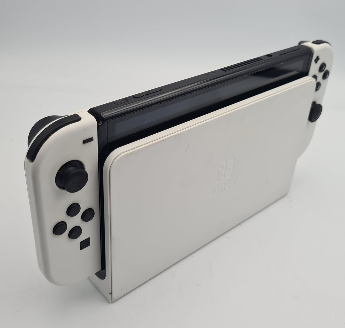 Nintendo Switch OLED 64GB white/black gaming console with joycons