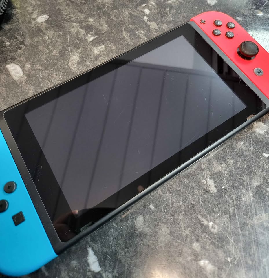 Nintendo Switch Console, 32GB + Neon Red/Blue Joy-Con