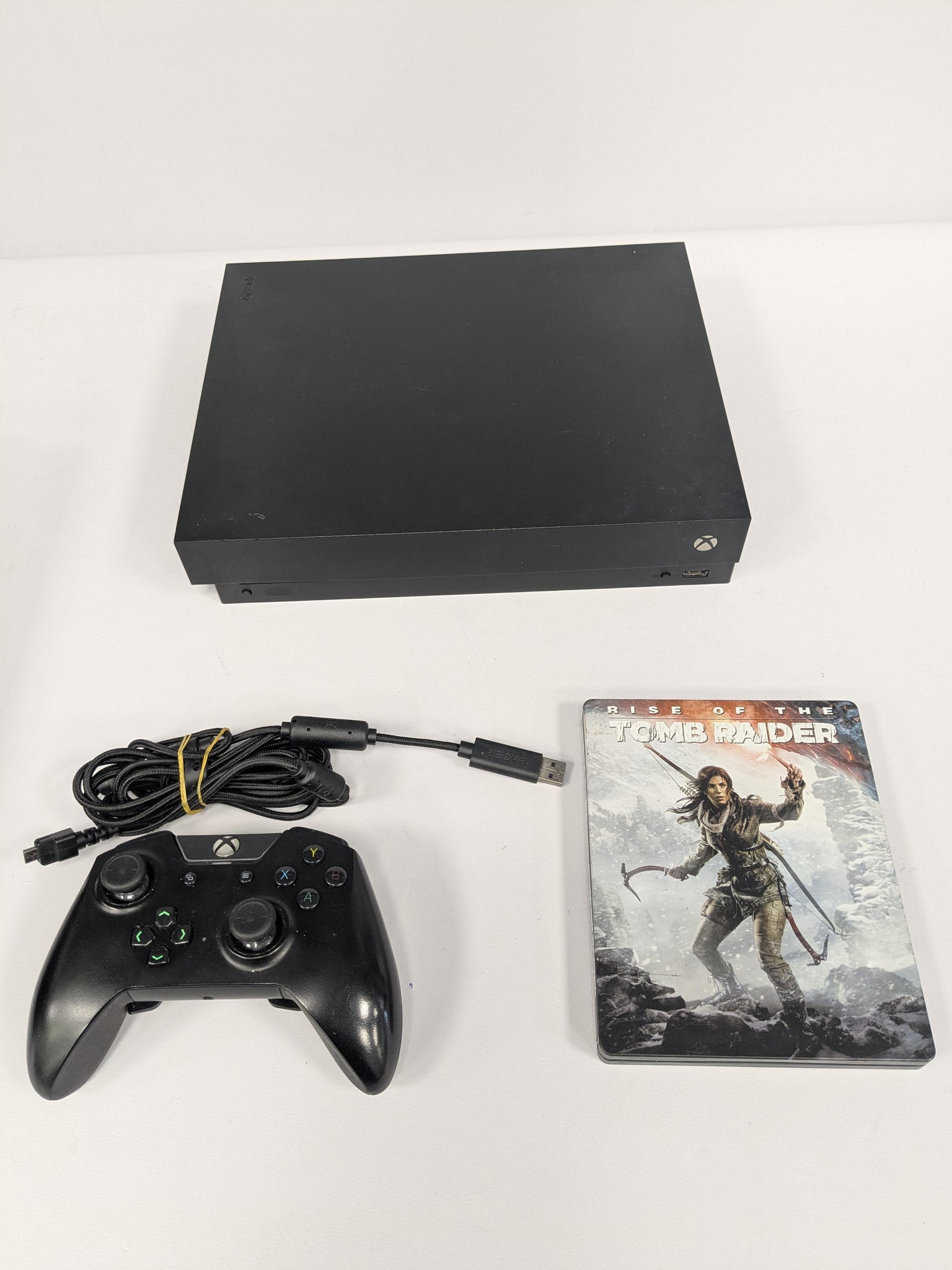 Xbox One X Console, 1TB Rise of the Tomb Raider  Package