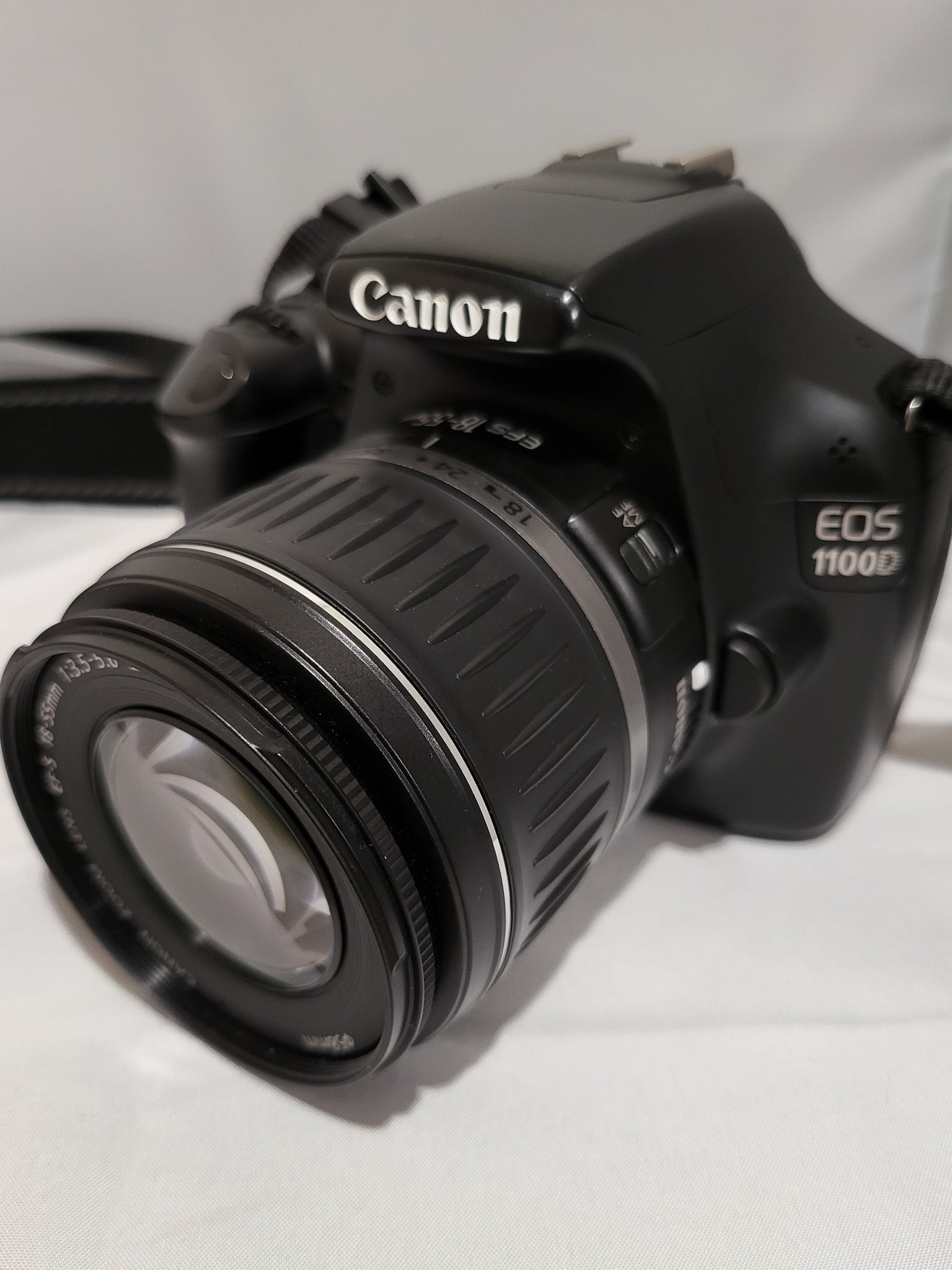 Canon EOS 1100D 12.0MP Digital SLR Camera with 18-55mm DC III Lens