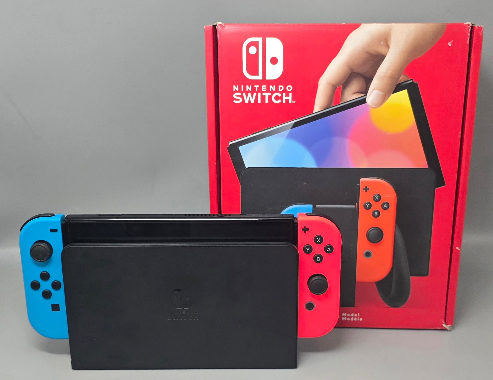 Switch Console, 64GB OLED + Neon Red/Blue Joy-Con, Boxed