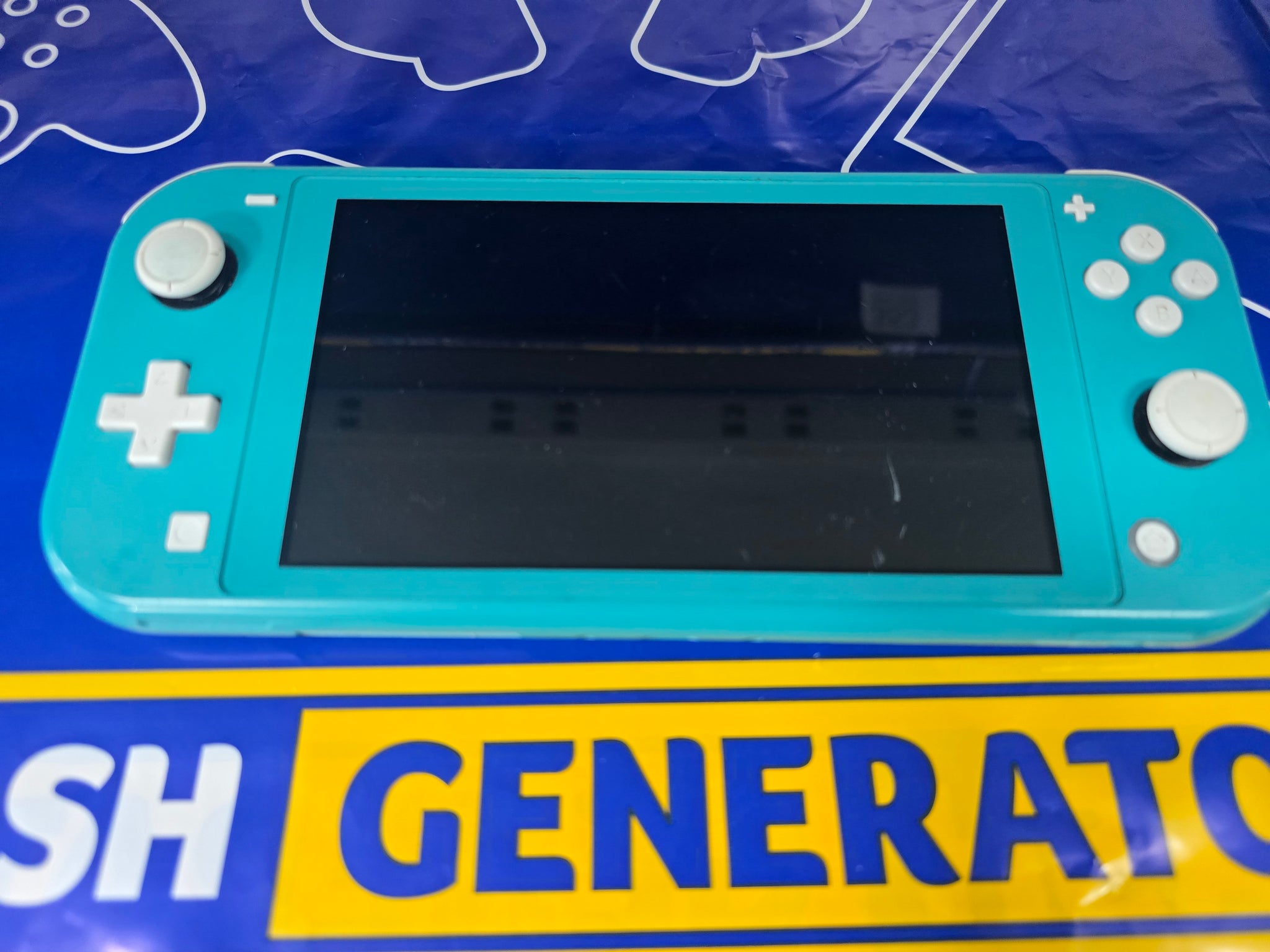 Switch Lite Turquoise Unboxed *Cable Only*