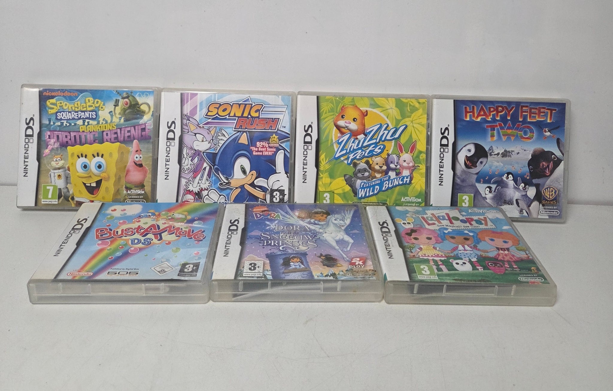 Nintendo DSi Metallic Blue Console & 7 Games