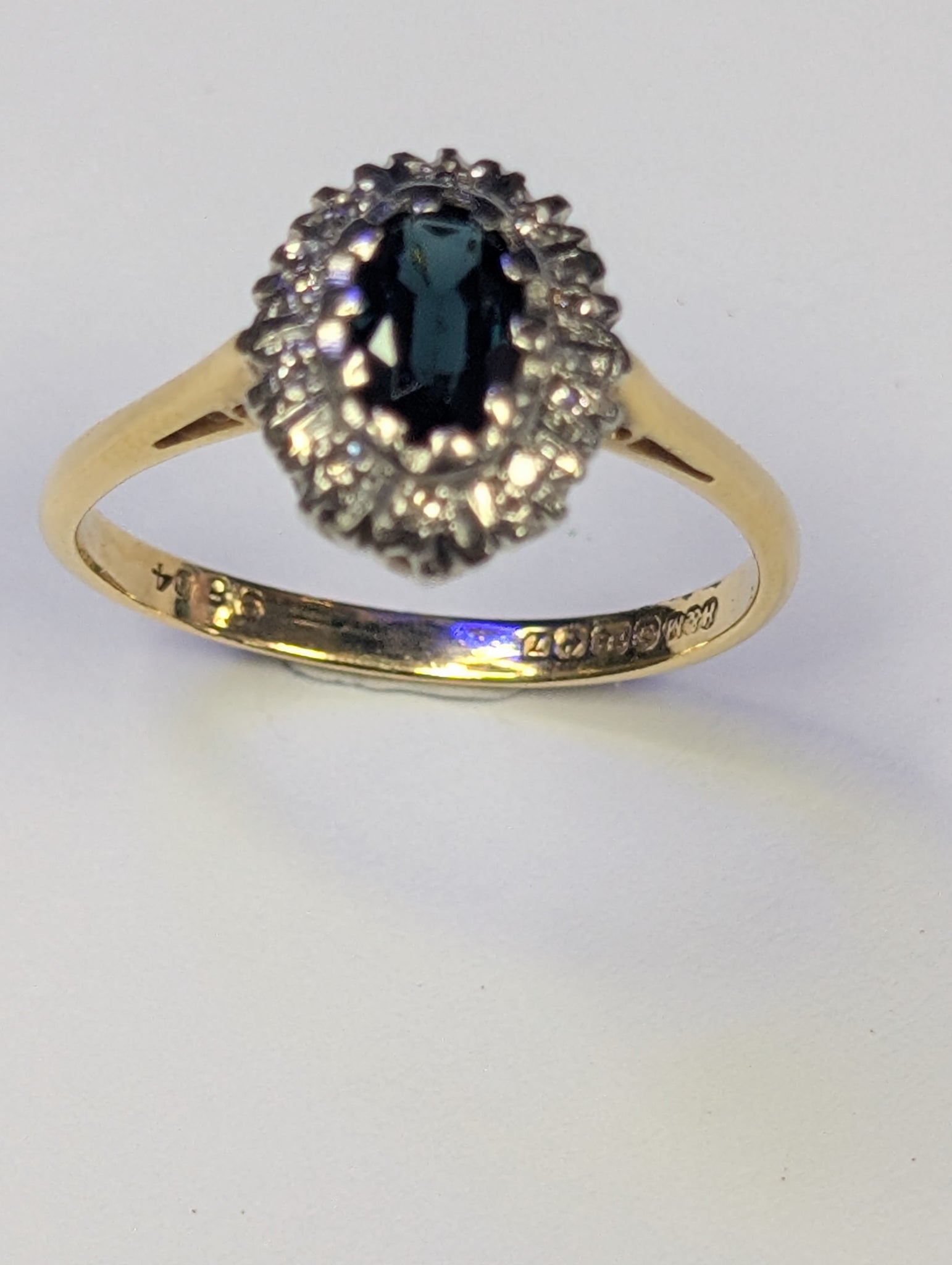 18ct gold diamond & black stone ring