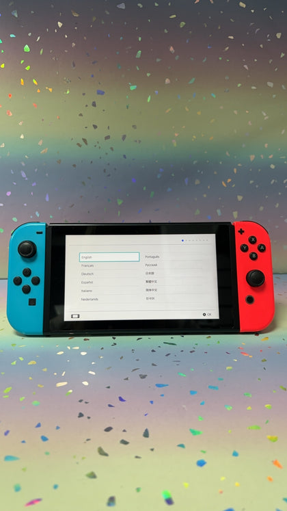 Nintendo Switch Console, 32GB + Neon Red/Blue Joy-Con