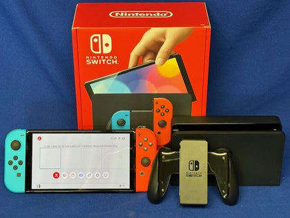 Nintendo Switch OLED - Neon Blue/Neon Red - Boxed.