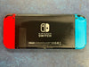 nintendo switch console red and blue joycons
