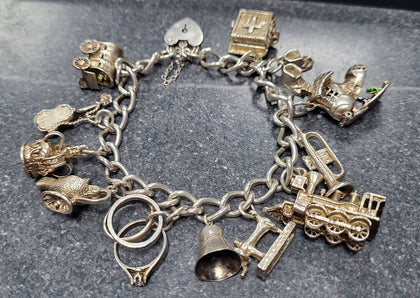 925 - Silver Charm Bracelet - 51.08g