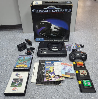 Sega Mega Drive Console with 2 controllers and games - Boxed