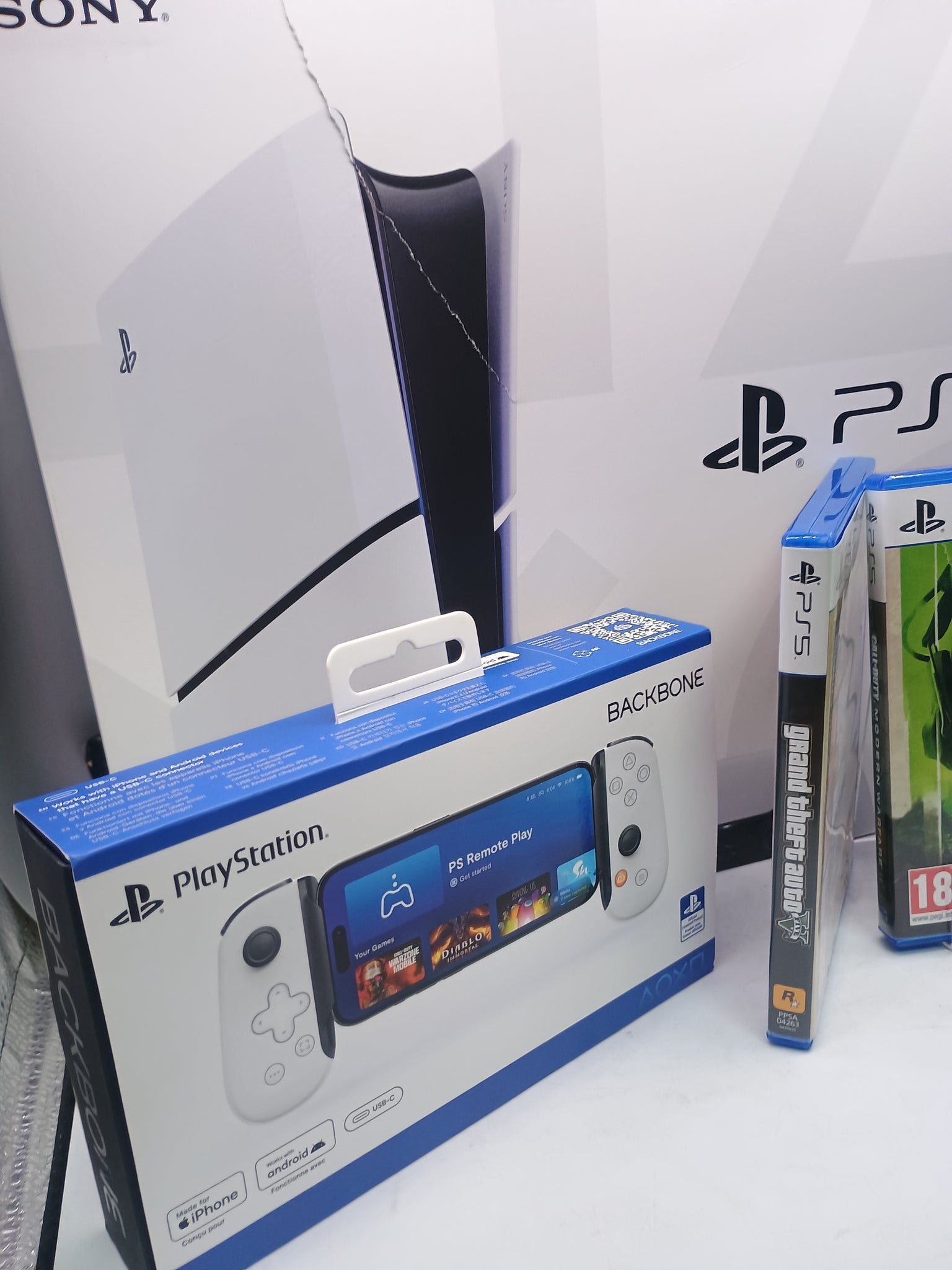 PS5 SLIM BUNDLE WITH BACK BONE & 3 GAMES