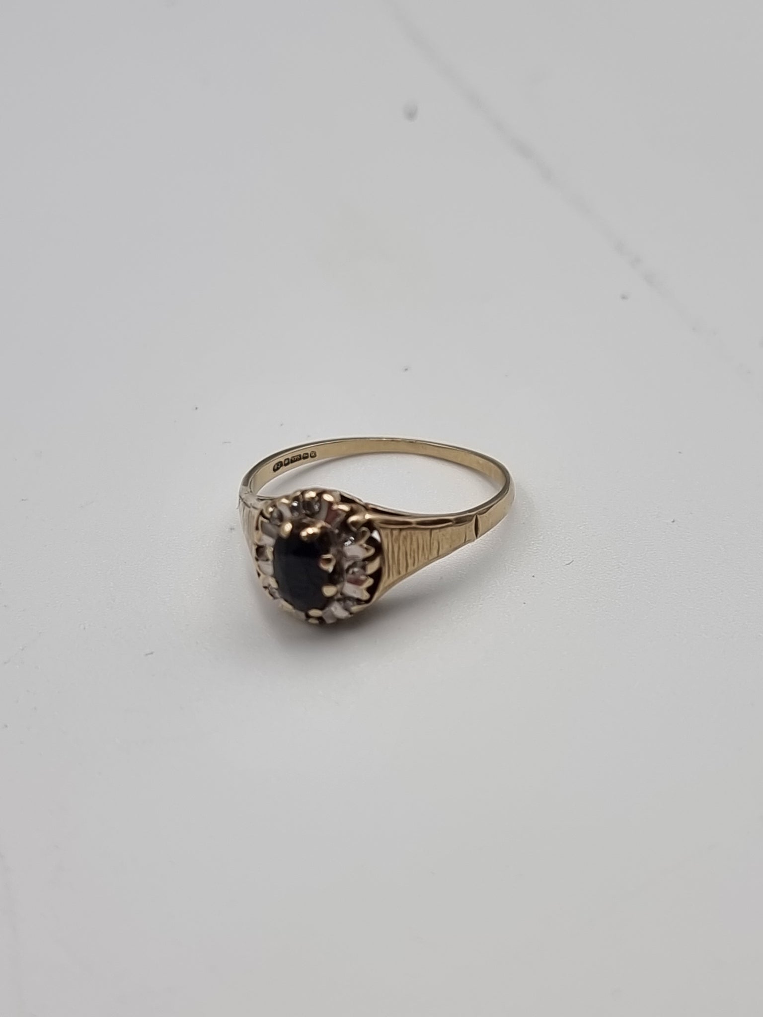 9CT Yellow Gold Ring With Black Stone And Diamond Stones - Size S - 2.43 Grams