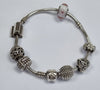 PANDORA SILVER SNAKE BRACELET WITH 7 CHARMS 20CM