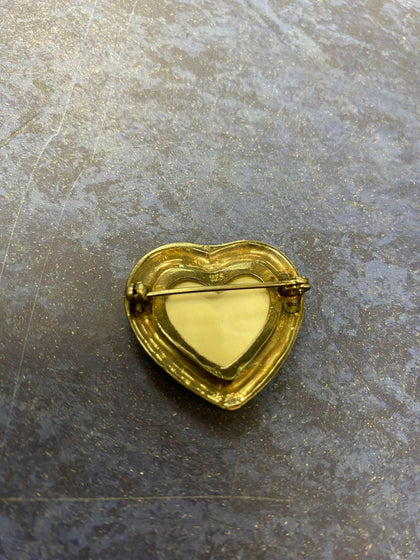 Silver heart pendant.