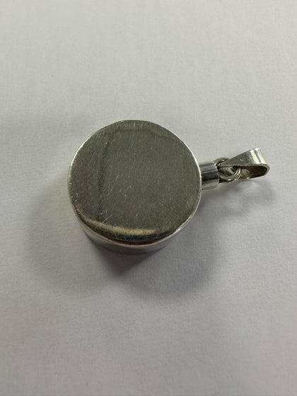 silver pendant.
